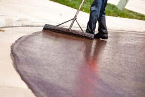 Industrial Surface Company In Cleveland, OH | Tennis Court Surfacing, Pickleball Court Surfacing, Seal Coating road worker resurfacing street with hot tar 2026 01 05 00 26 33 utc
